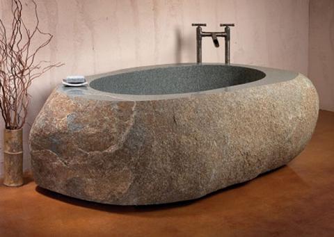 Baños hechos con piedra esculpida